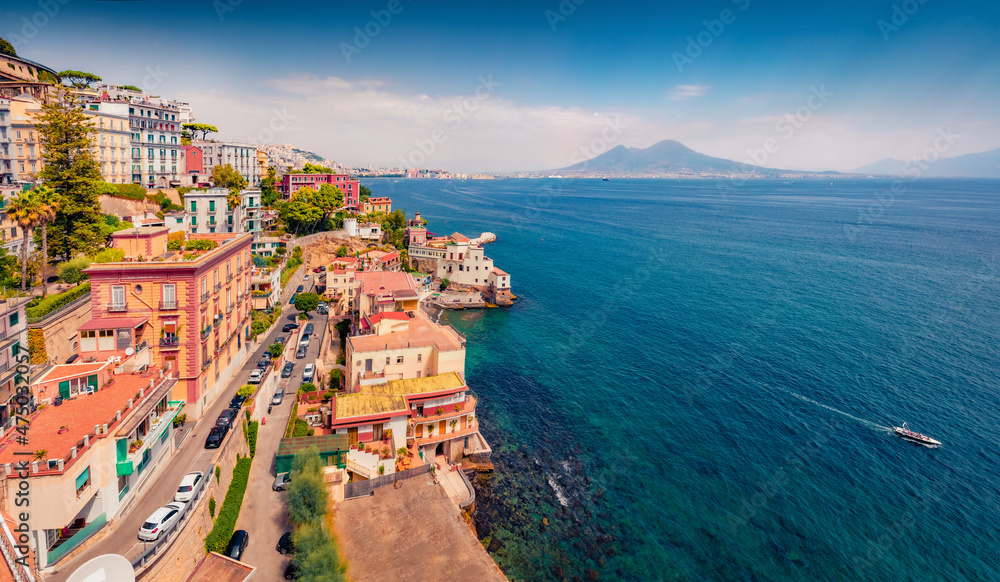 Сharm of the ancient cities of Europe. Colorful summer cityscape of Naples, Italy. Impressive seascape of Mediterranean seascape. Traveling concept background.