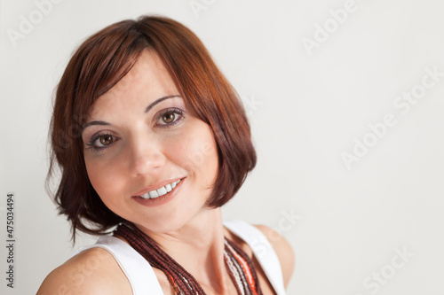 Happy Russian woman in casual on white background