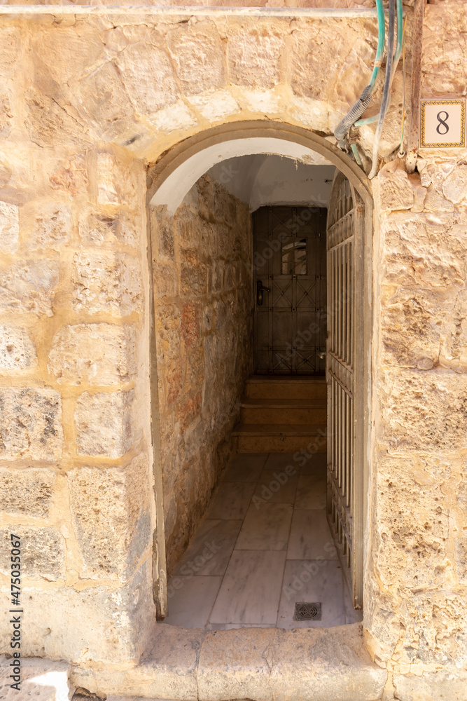 Tunnel  passage to a residential building on the quiet small Ararat Street in the Armenian quarter in the old city of Jerusalem, Israel