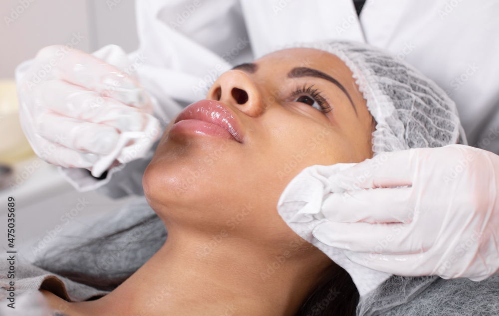 Procedure for manual cleansing of the facial skin from blackheads and acne. Beauty parlour. Procedure for manual cleansing of the facial skin from blackheads and acne. Beauty parlour.