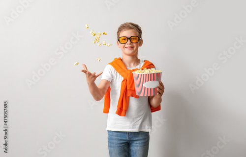 Little boy in eyeglasses th...