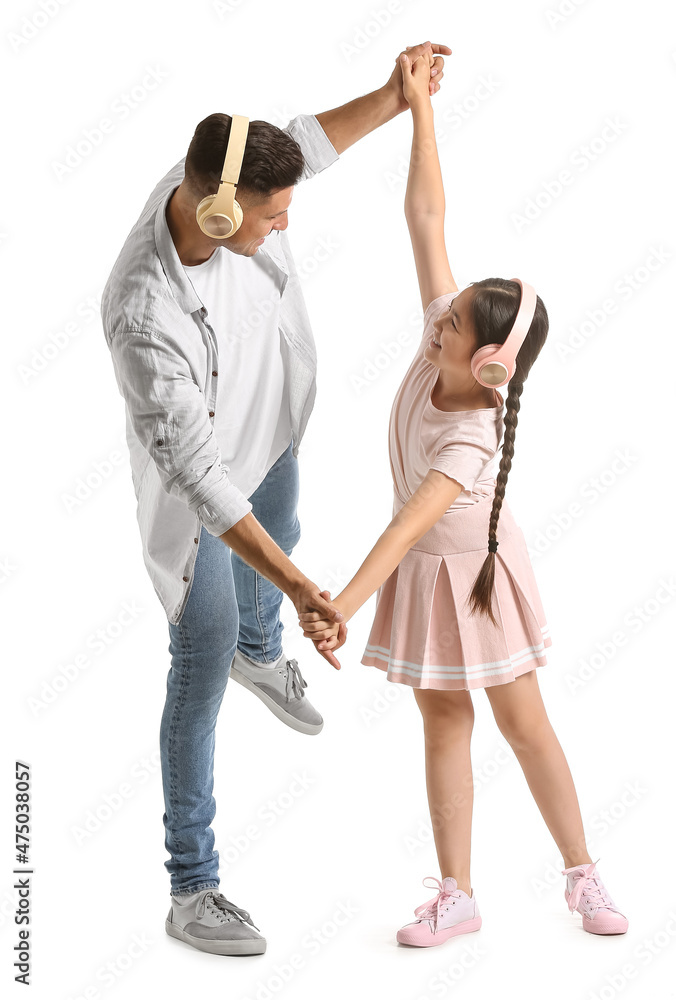 Fototapeta premium Dancing man and his little daughter on white background