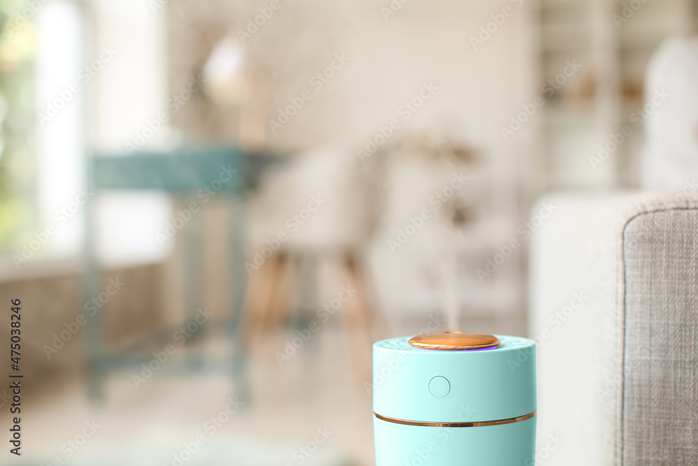 Naklejka premium Modern humidifier in living room, closeup