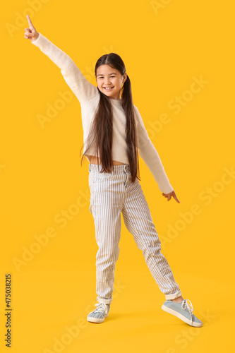 Dancing little girl on colo...