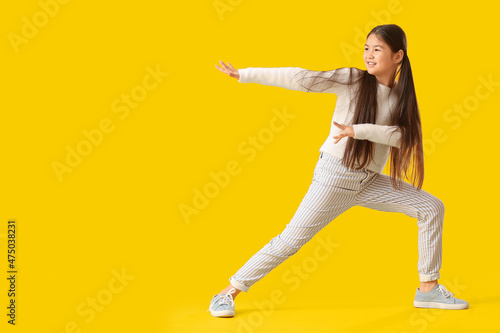 Dancing little girl on colo...