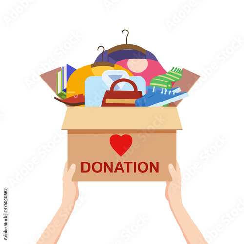 Hands hold a donation box with clothes, books, shoes. help for refugees, poor kids. Awareness and charity concept, vector, illustration flat cartoon style