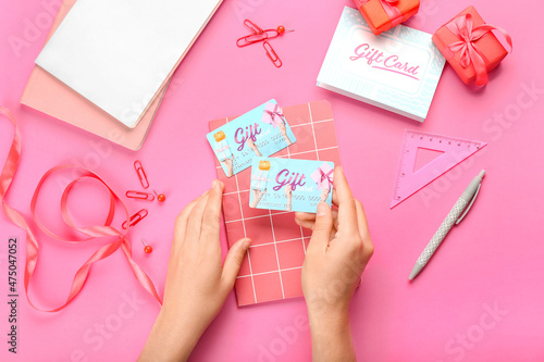 Woman with gift card and st...