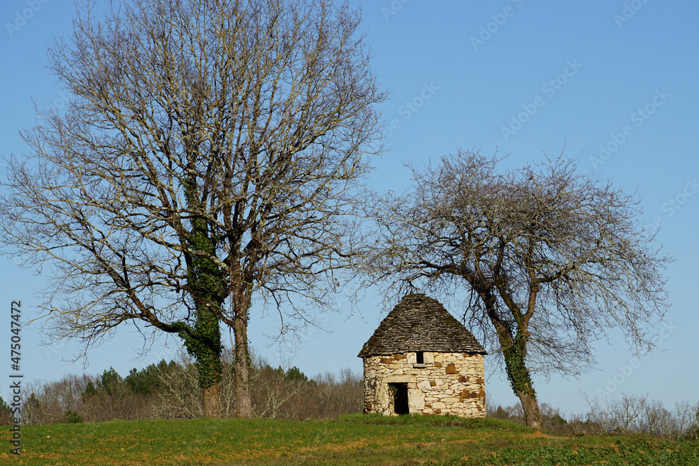old stone round small shelter in the countryside old stone round small shelter in the countryside