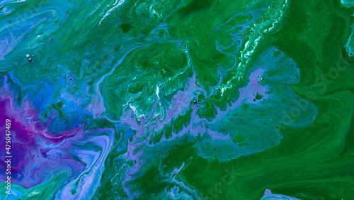 The colors of the aqueous ink are translucent. Abstract multicolored marble texture background