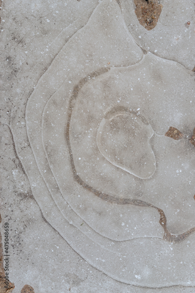 Obraz premium Abstract ice background with cracks on the ice surface