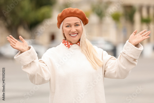 Happy mature woman in styli...