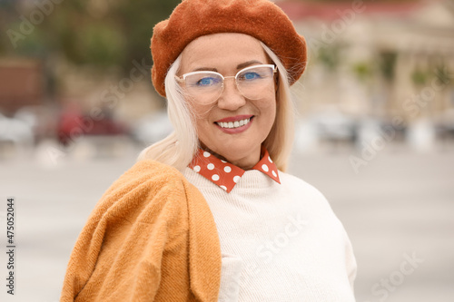 Elegant mature woman in ber...