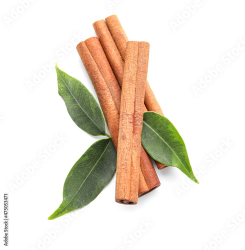 Natural cinnamon sticks on white background