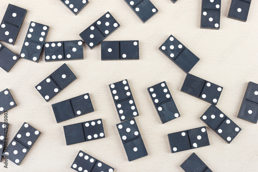 Board game dominoes on light table. View from above. Board game dominoes on light table. View from above.