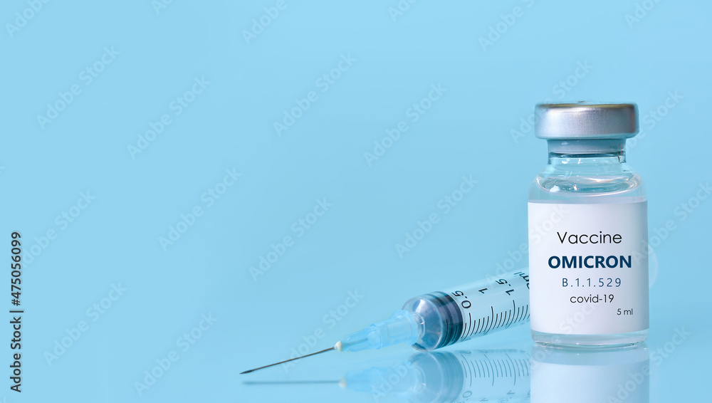 Bottle of Covid-19 vaccine to immunize from the Omicron Variant Coronavirus. The concept of medicine, healthcare and science.Copy space for text. Bottle of Covid-19 vaccine to immunize from the Omicron Variant Coronavirus. The concept of medicine, healthcare and science.Copy space for text.