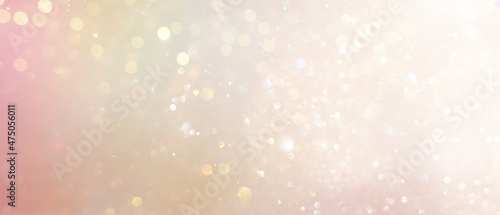 background of abstract gold and silver glitter lights. defocused