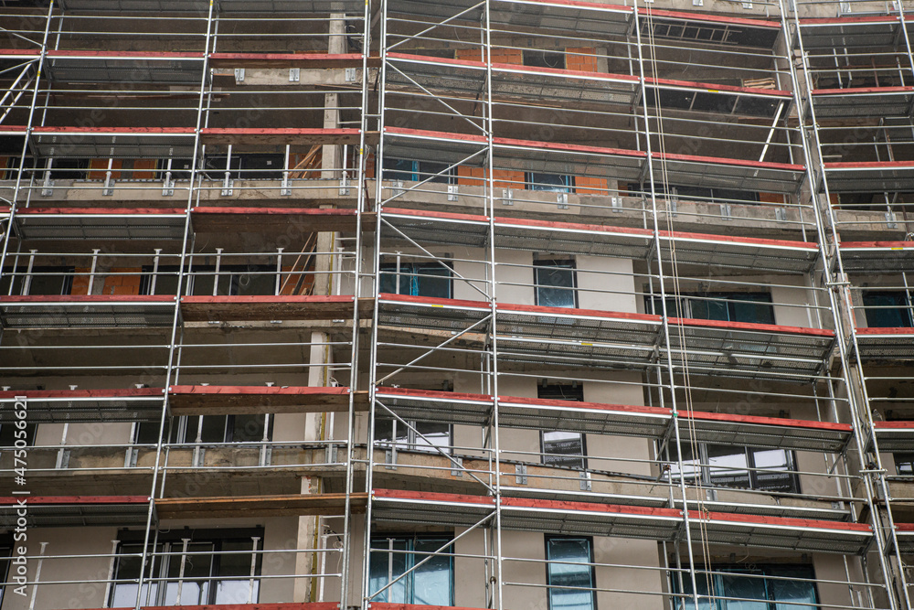 Construction of a building using scaffolding Construction of a building using scaffolding
