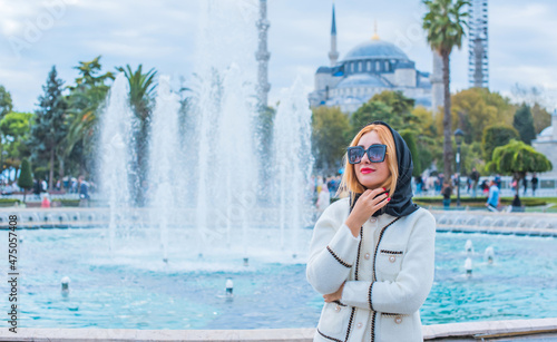 Fototapeta Naklejka Na Ścianę i Meble -  Travelling concept. Modern beautiful woman in city Istanbul, vacation in Turkey.