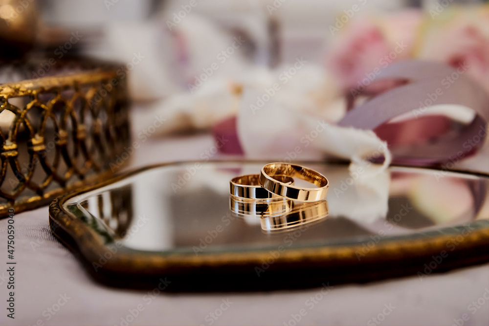 gold wedding rings on mirror gold wedding rings on mirror