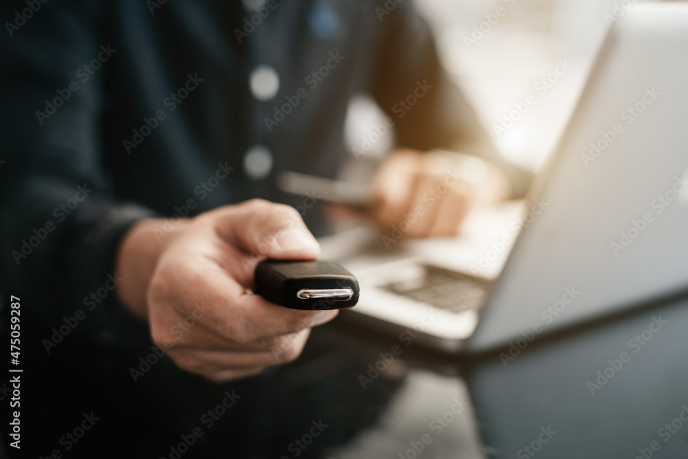 Closeup a car key and money for loan credit financial, lease and rental concept. Closeup a car key and money for loan credit financial, lease and rental concept.