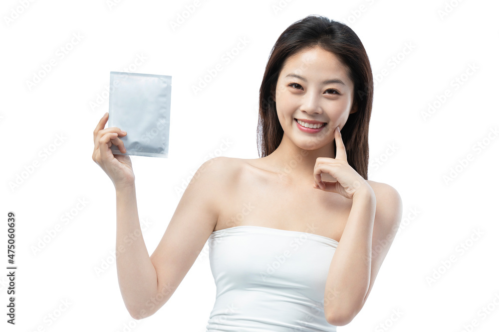Beautiful young woman holding a facial mask Beautiful young woman holding a facial mask