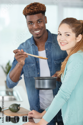 beautiful young couple preparing a healthy meal together