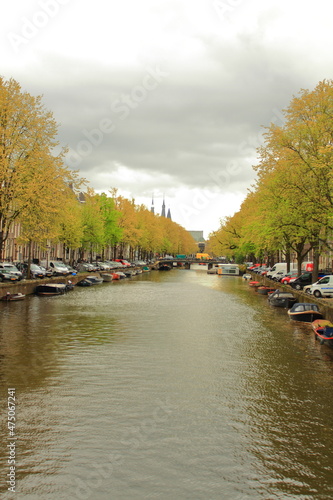 Beautiful view of the canals in the city of Amsterdam. 