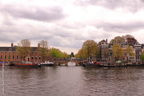 Beautiful view of the canals in the city of Amsterdam. 