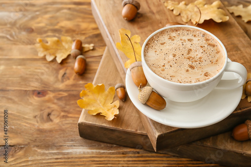 Cup of coffee with acorns a...