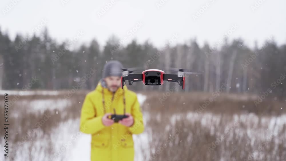 Drone flies in front of the camera, close-up Drone flies in front of the camera, close-up
