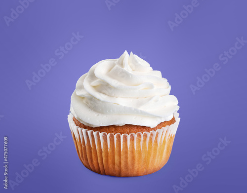 Cupcake on violet (very peri) background.
