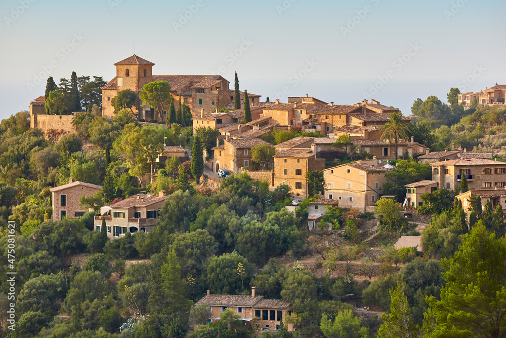 Traditional stone houses and tramuntana mountains in Deia. Balearic islands