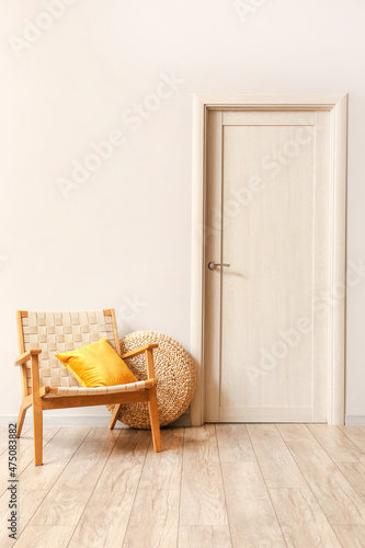 Modern armchair with pillow...