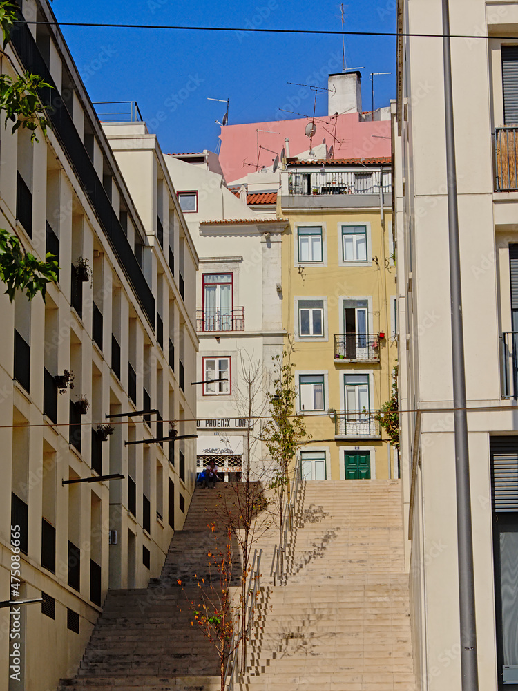 Staircase and traditional houses on a hill slope of Lisbon