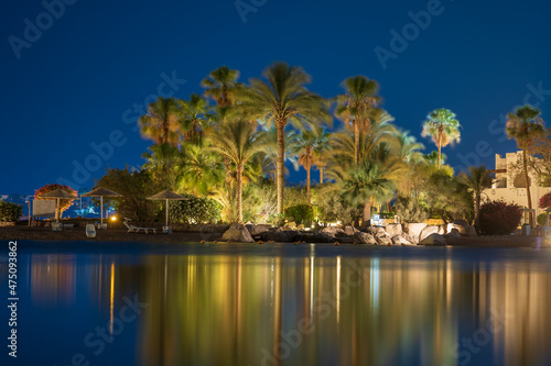 Calm beach on the red sea at night in Sharm El Sheikh, Egypt © OlegD