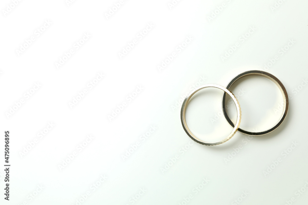 Couple of wedding rings on white background Couple of wedding rings on white background