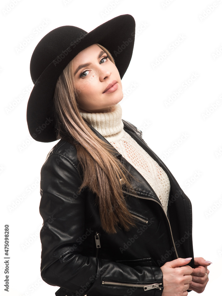 Fototapeta premium Woman in black felt hat and leather jacket
