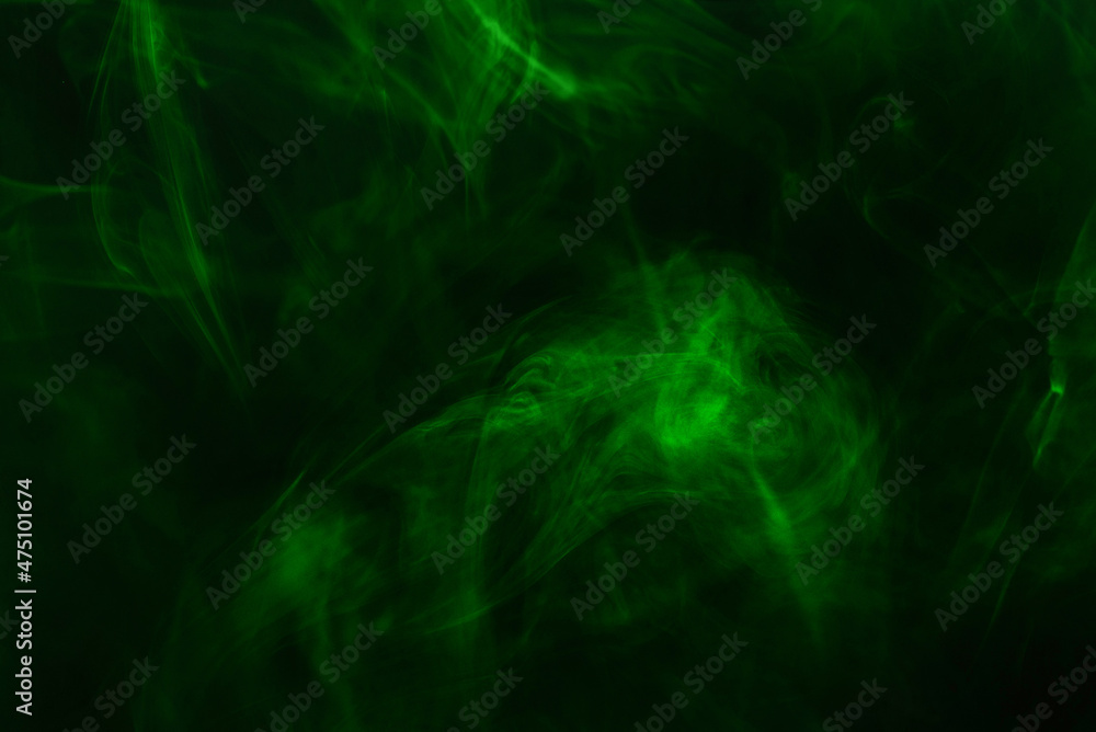 Green steam on a black background. Green steam on a black background.