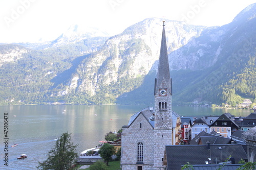Hallstatt is spectacularly picturesque, due to its location on a narrow rocky west bank of the Hallstatt lake with the sheer rising mountains behind it