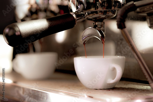espresso shot from coffee machine in coffee shop,Coffee maker in coffee shop Fototapet