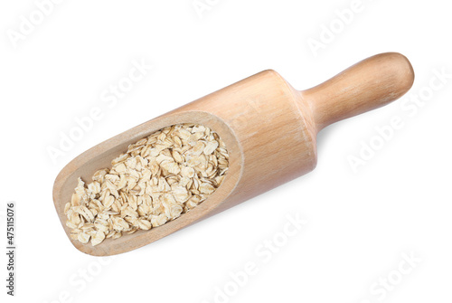 Raw oatmeal in wooden scoop on white background, top view