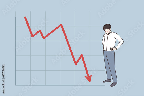 Unhappy businessman stand near graph going down distressed with business bankruptcy or crisis. Upset man employee or worker stressed with bad financial statistics. Flat vector illustration. 