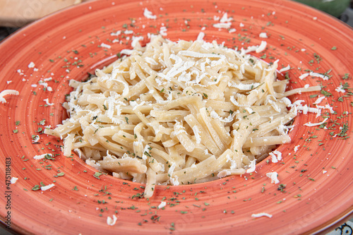 Turkish style cheese pasta (Turkish name; Peynirli eriste makarna).  Eriste from Traditional Turkish Cuisine. photo