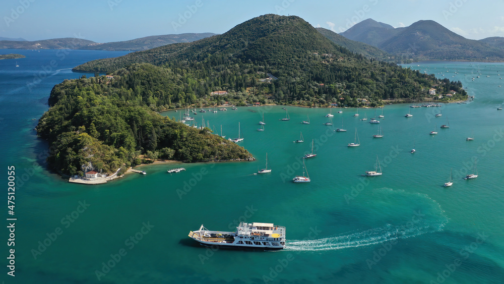 Aerial drone photo of fjord shaped port of Nydri a calm sea safe anchorage for sail boats and yachts famous for trips to Meganisi, Skorpios and other Ionian islands, Lefkada island, Greece Aerial drone photo of fjord shaped port of Nydri a calm sea safe anchorage for sail boats and yachts famous for trips to Meganisi, Skorpios and other Ionian islands, Lefkada island, Greece