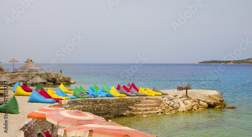 Fototapeta Naklejka Na Ścianę i Meble -  Beach with azure water of the Ionian Sea in Ksamil, Albania	
