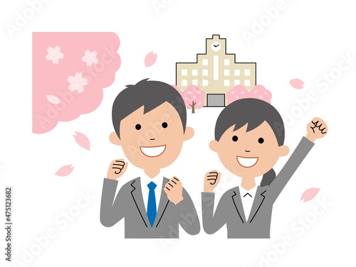 大学と男女卒業生　ガッツポーズ桜舞う　上半身
