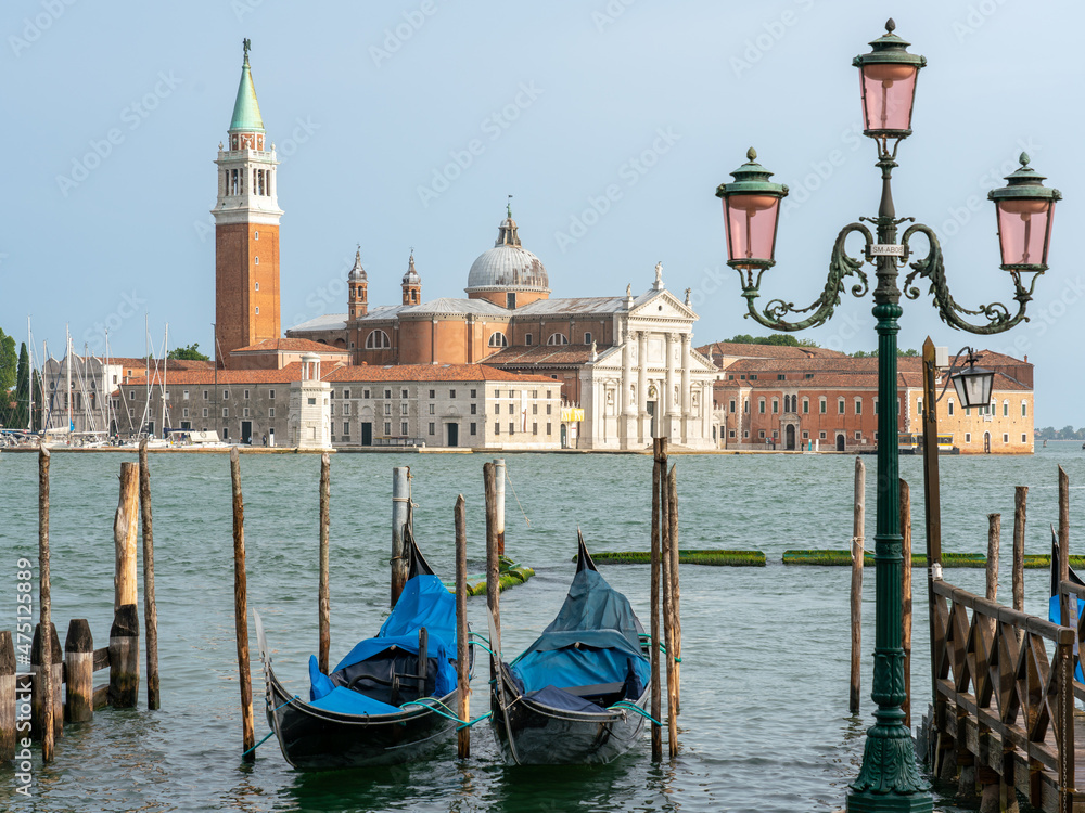 Classic view of gondolas in Venice with San Giorgio Maggiore church in background