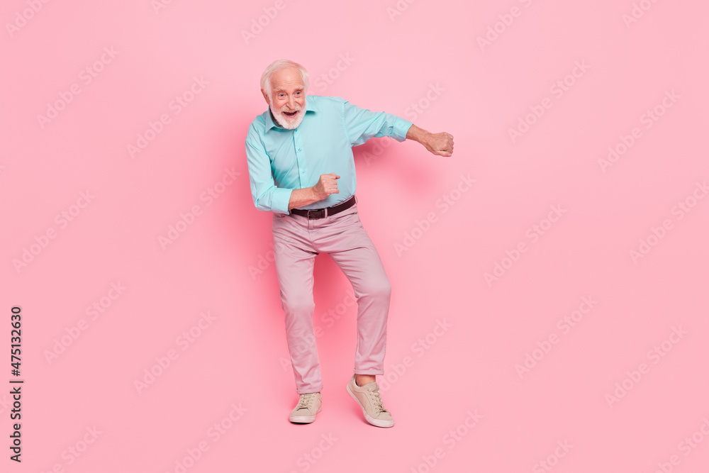 Full length photo of dynamic middle age man dance discotheque well groomed isolated pastel color background Full length photo of dynamic middle age man dance discotheque well groomed isolated pastel color background