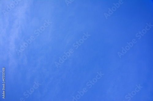 Background of blue sky and barely noticeable clouds and fog