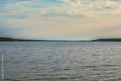 Lake, sea with cloudy sky. Beautiful dramatic cloudscape, cloudy sky background © Enrico Buss